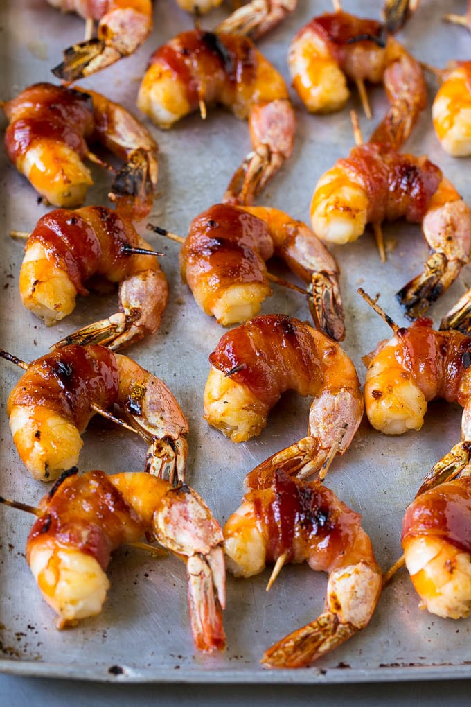 Bacon Wrapped Shrimp Recipe | Bacon Shrimp #shrimp #bacon #appetizer #dinner #sraye #seafood Roasted shrimp with a piece of bacon around each one.