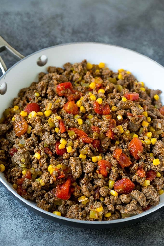 Mexican Lasagna Recipe | Mexican Casserole #mexican #lasagna #groundbeef #beans #dinner #cheese #sraye Ground beef cooked with tomatoes, green chilies and corn.