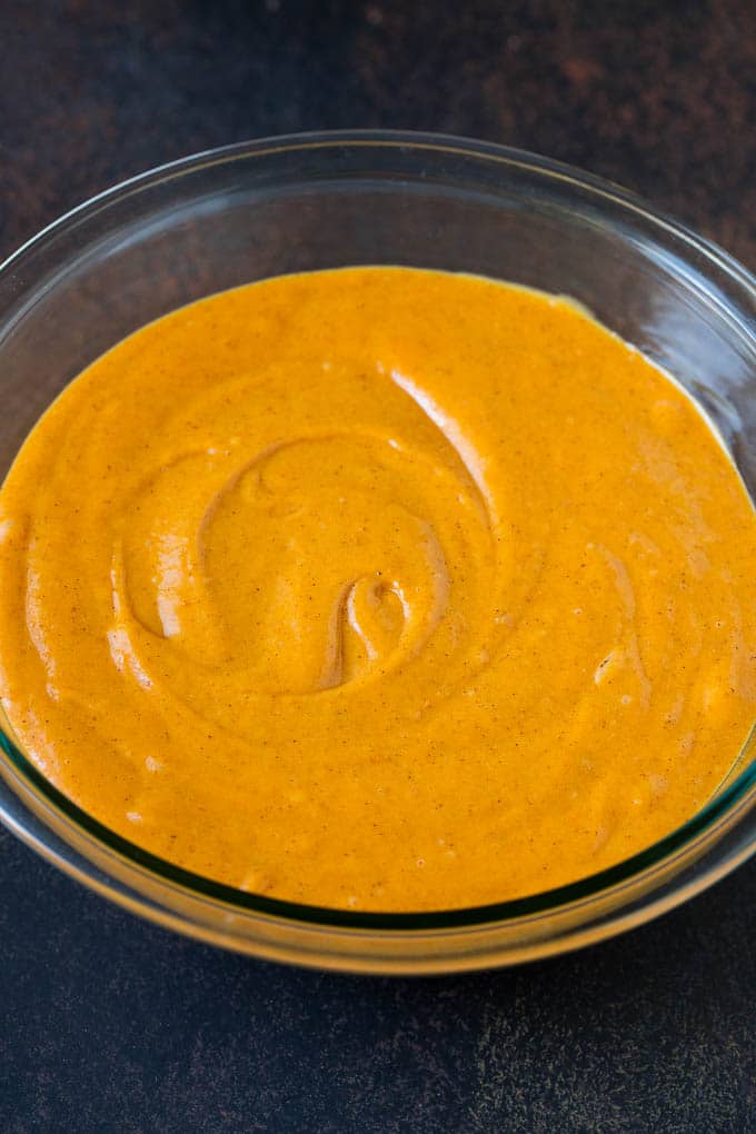 Pumpkin Cake Recipe | Pumpkin Spice Cake #cake #pumpkin #dessert #baking #fall #thanksgiving #sraye Cake batter in a mixing bowl.