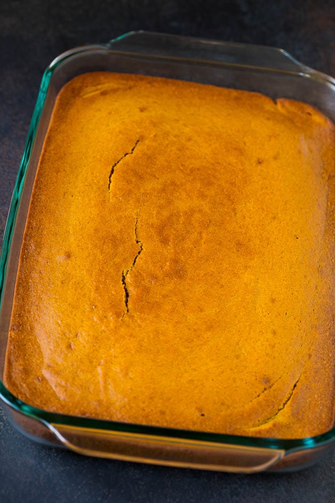 Pumpkin Cake Recipe | Pumpkin Spice Cake #cake #pumpkin #dessert #baking #fall #thanksgiving #sraye A baked base in a glass dish ready for frosting.