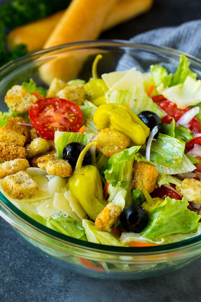 Olive Garden Salad Recipe | Italian Salad #salad #lettuce #olives #sidedish #dinner #sraye A tossed Olive Garden salad with Italian dressing, vegetables and olives.