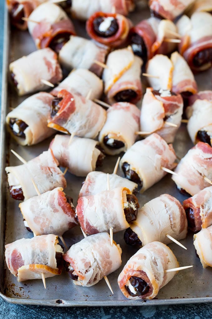 Bacon Wrapped Dates #appetizer #bacon #dates #cheese #sraye Dates wrapped in bacon and secured with toothpicks.