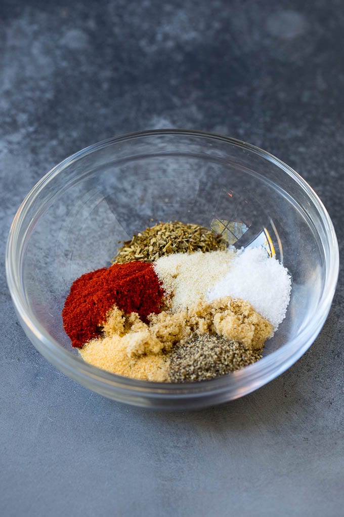 Baked Chicken Breast Recipe #chicken #dinner #sraye Herbs and seasonings in a mixing bowl.