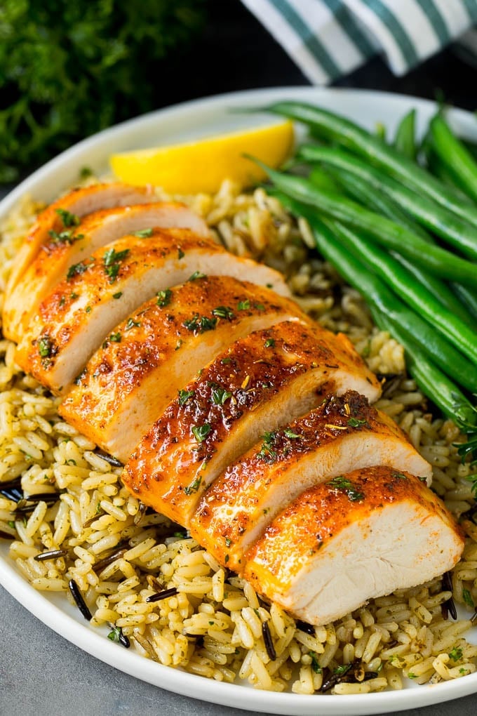 Baked Chicken Breast Recipe #chicken #dinner #sraye Baked chicken breast served with rice and green beans.