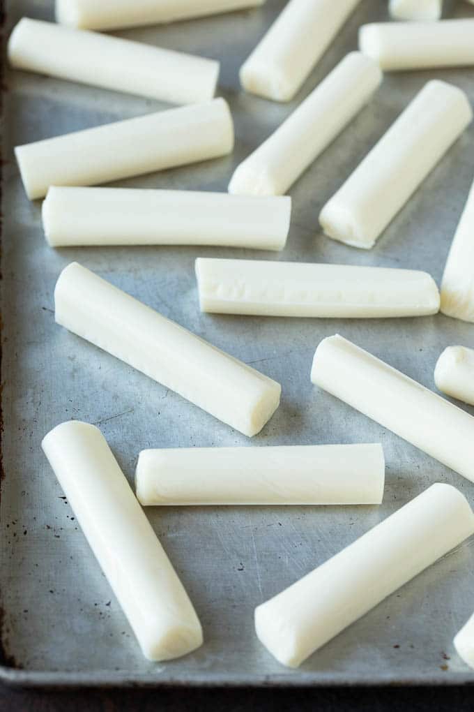 Mozzarella Sticks Recipe #cheese #appetizer #sraye Cheese sticks on a sheet pan.