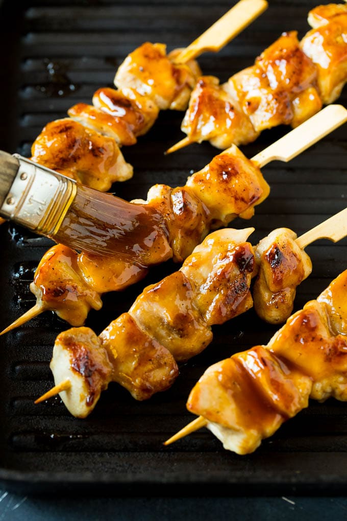 Chicken Yakitori Recipe | Grilled Chicken #chicken #grilling #dinner #sraye A basting brush putting sauce onto grilled chicken yakitori..