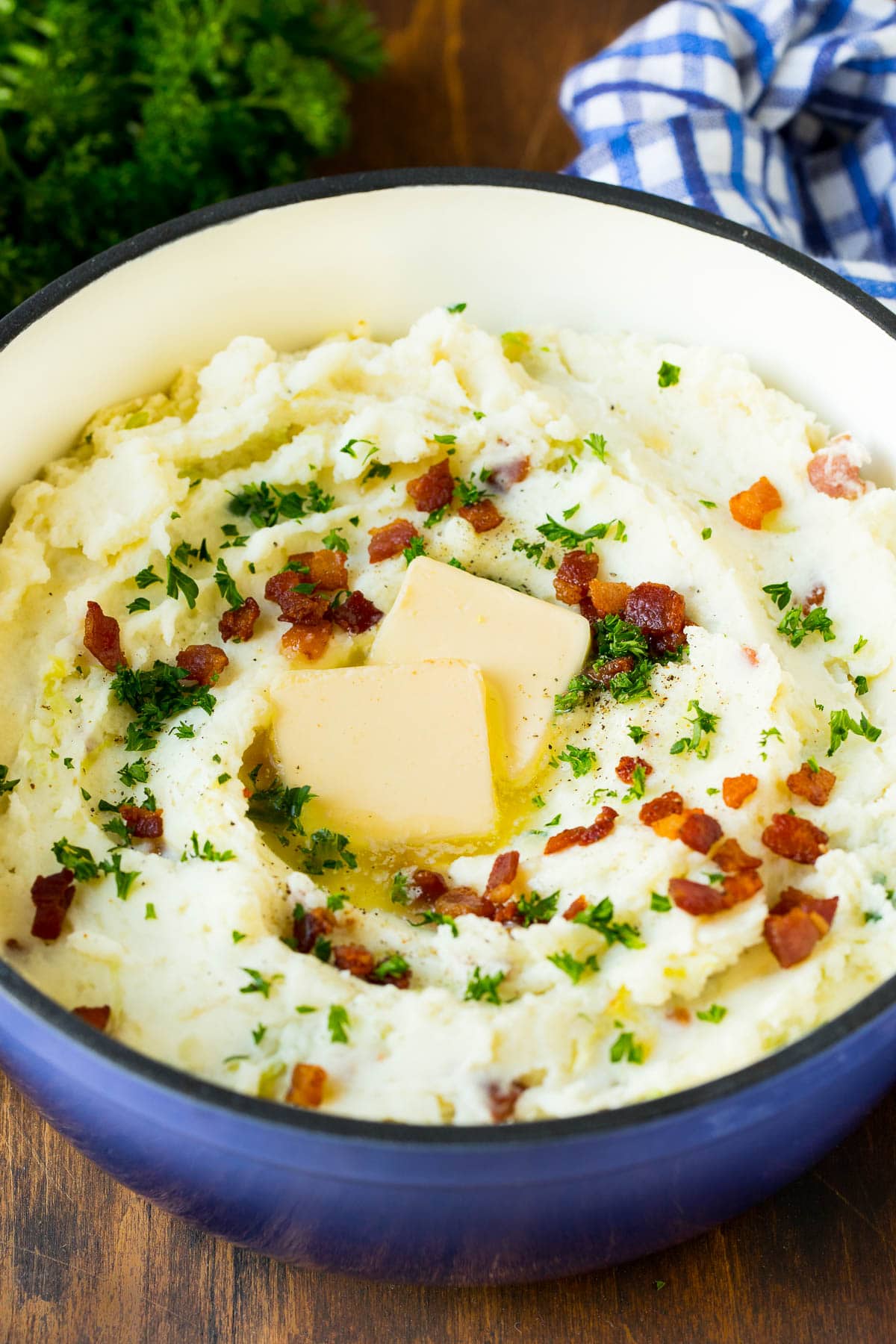 Colcannon Recipe | Mashed Potatoes #potatoes #cabbage #bacon #sidedish #stpatricksday #dinner #sraye A pot of colcannon garnished with butter, bacon and herbs.